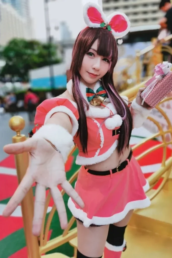The beautiful Thai girl Aokochan smiling with a christmas costume.