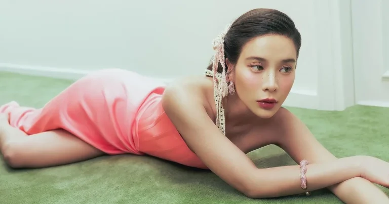 The hot Thai model Supassara Thanachart with a pink dress for a photoshoot.