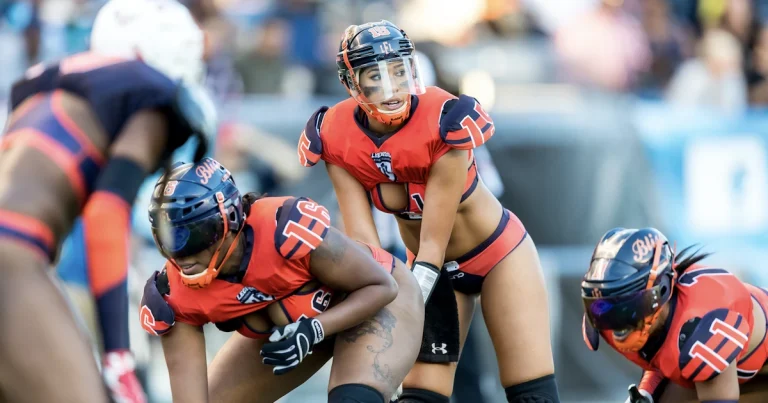jayne caldwell playing american football wearing a sexy uniform like her teammates