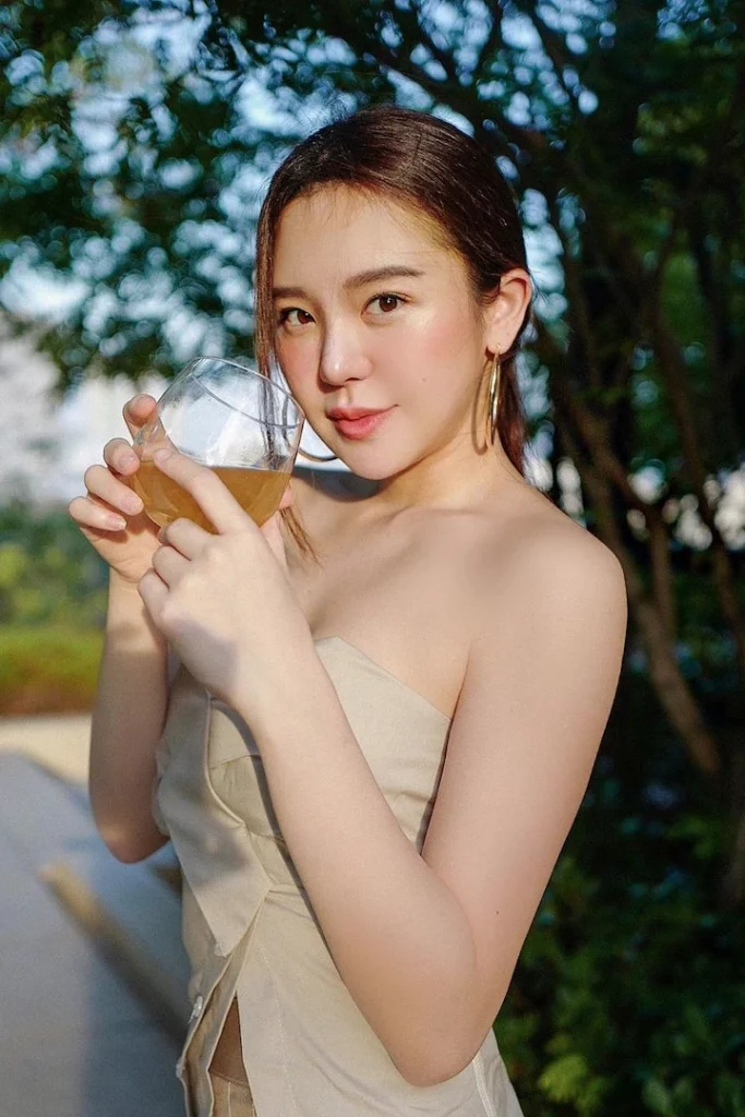 Thai model Mind Napasasi drinking