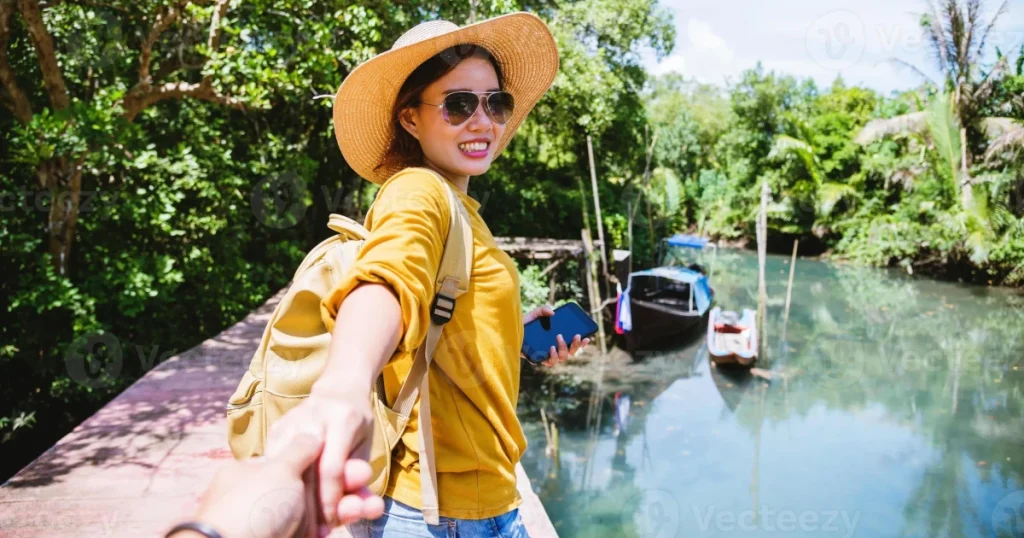 A sexy Thai travel companion give her hand and smile.