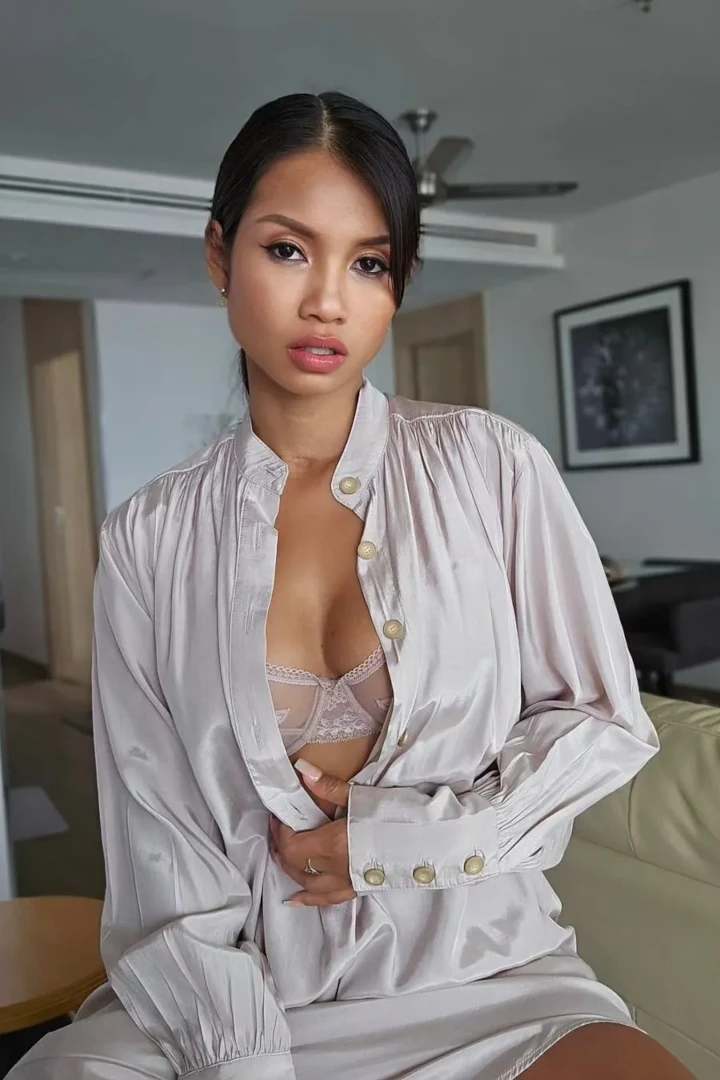 Thai content creator Budsara with hot white lingerie.