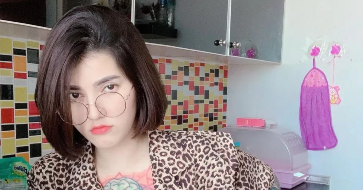 Thai model Emhuayza with glasses in the kitchen