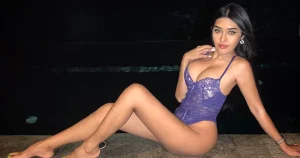 Thai model Ploy Napattara posing with a blue body lingerie